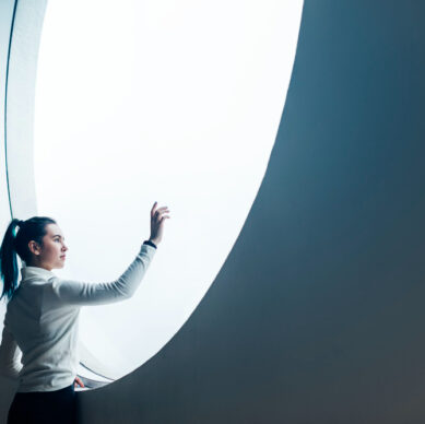 girl-using-touch-screen-modern-smart-home